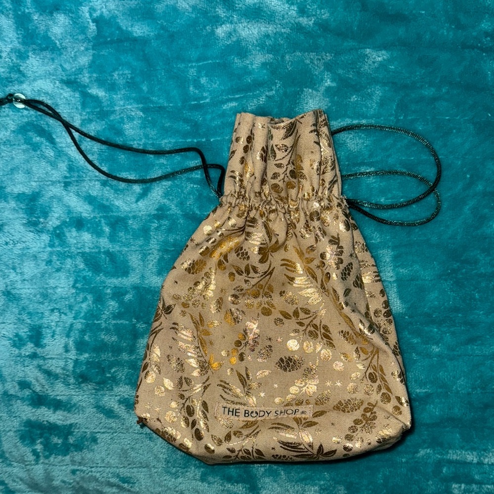 The Body Shop Gold Floral Drawstring Bag